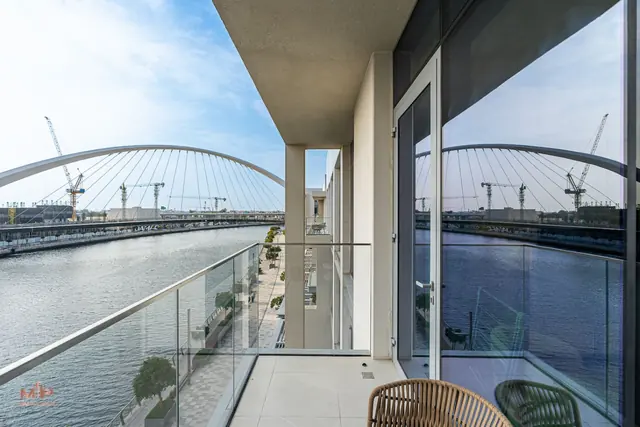 Canal-Side Living | Elegant 2BR | Canal Front photo 2